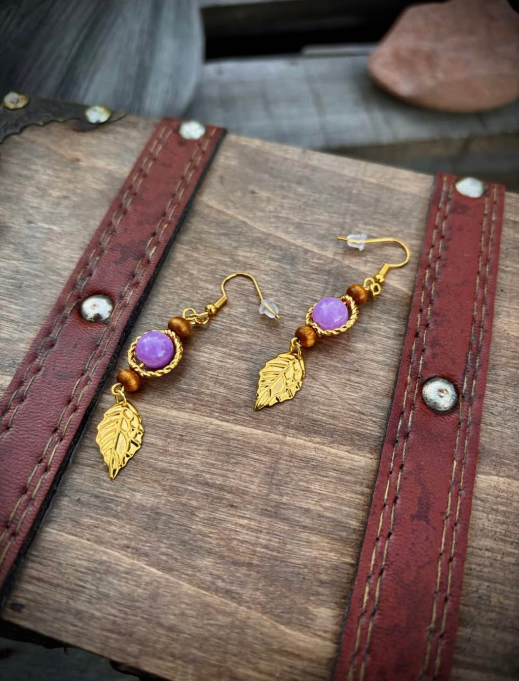 Purple stone and gold feather earrings