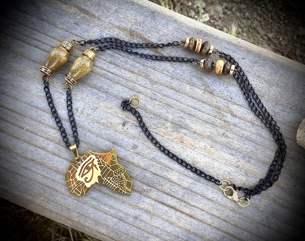 Golden African eye necklace