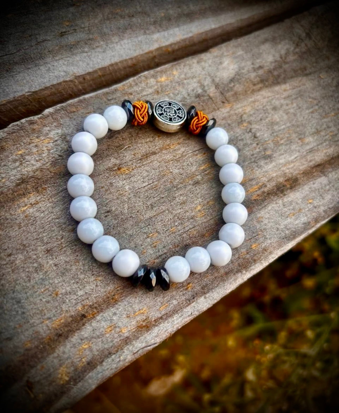 Mixed white jade bracelet with Chinese happy sign pendant