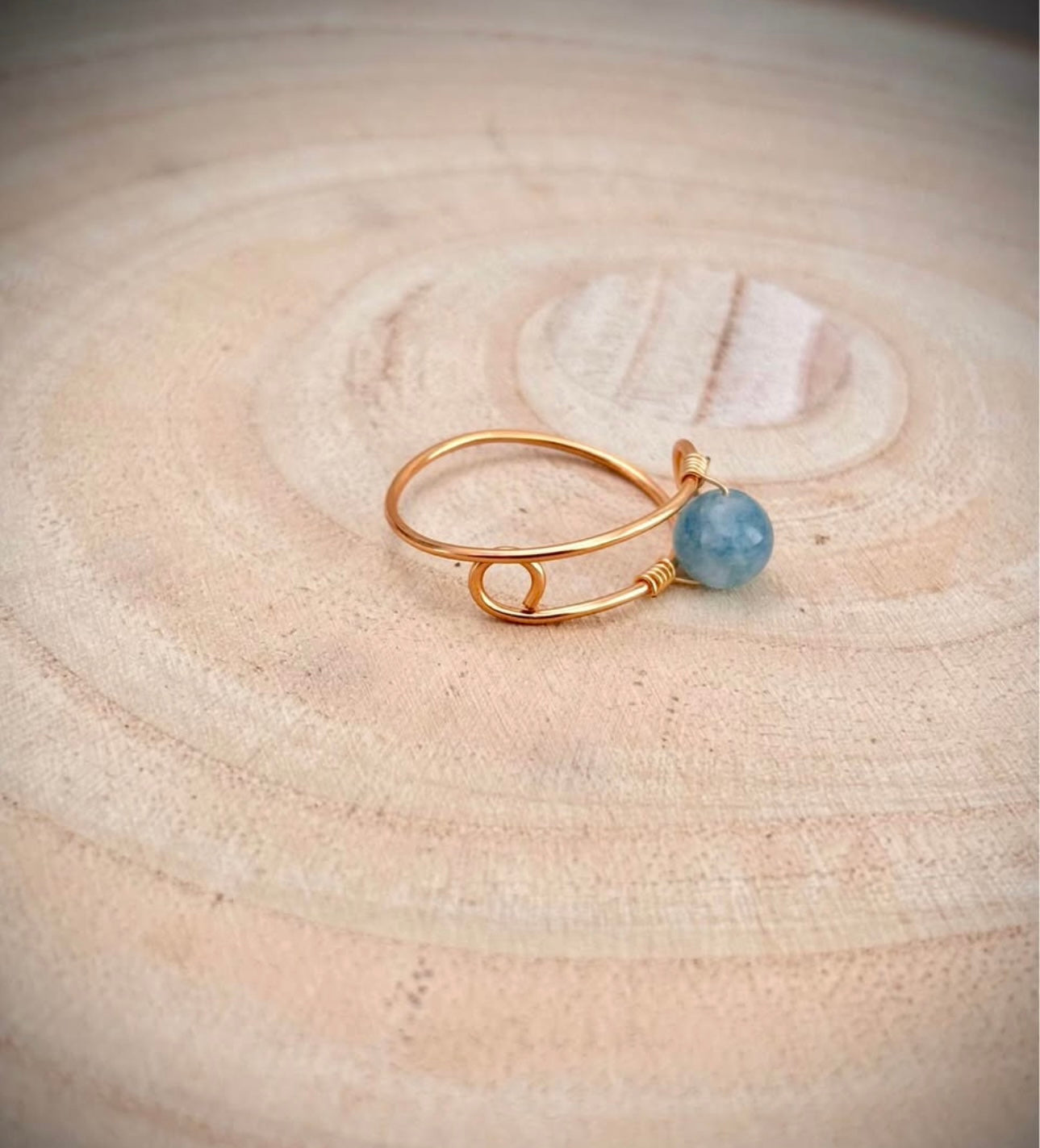 Gold wire wrap ring blue aquamarine