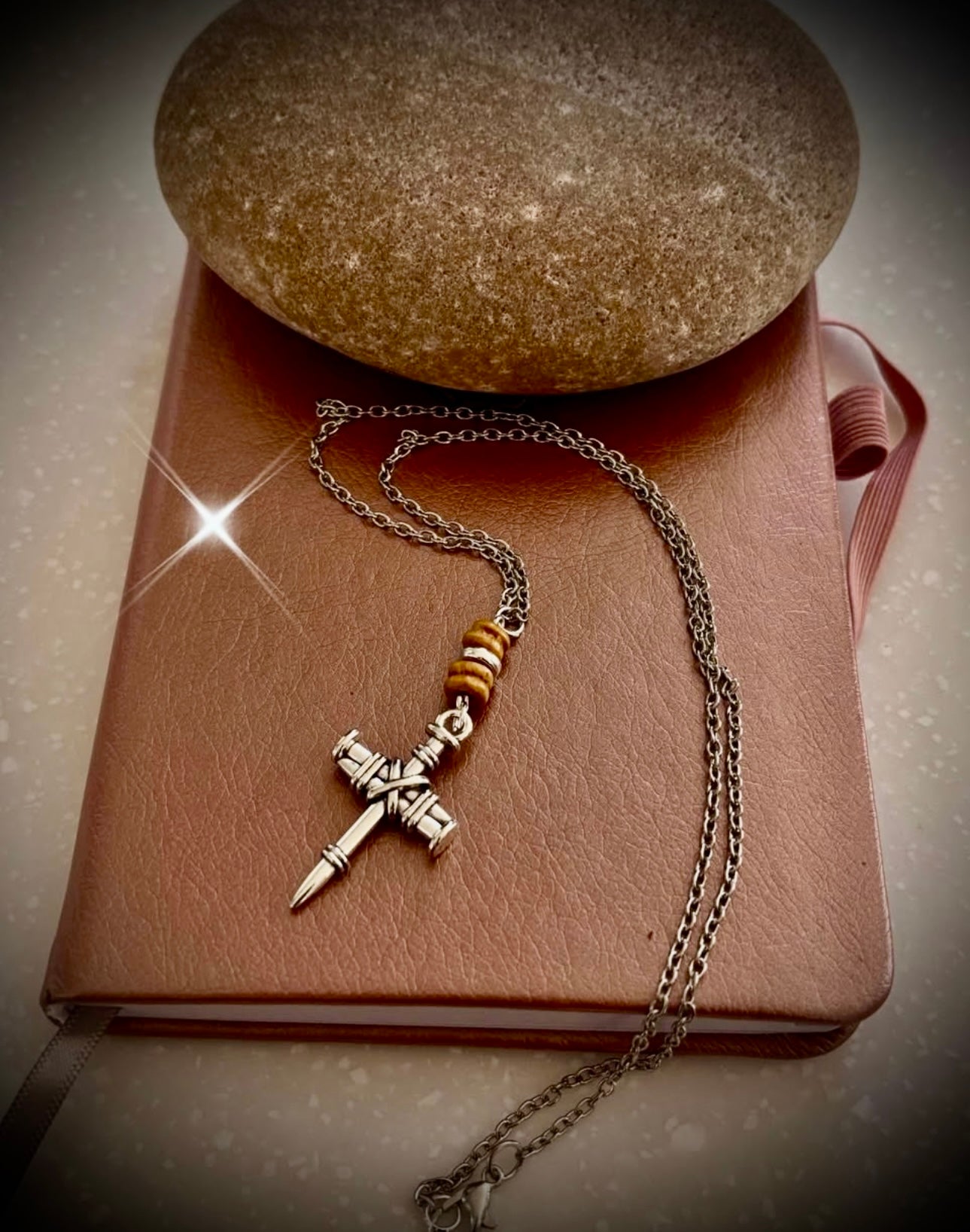 White silver nail cross