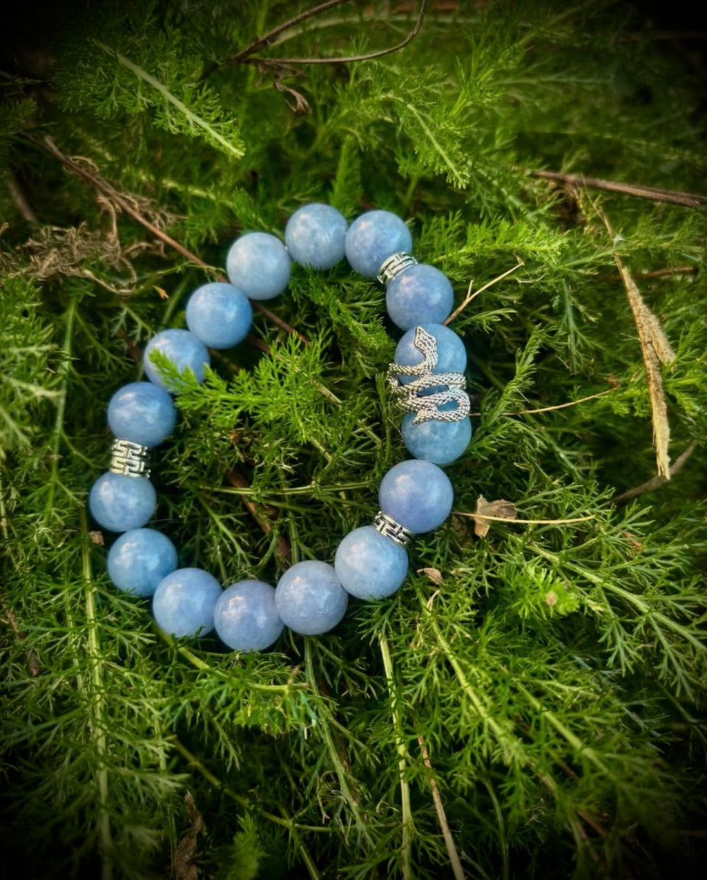 Aquamarine bracelet with silver snake