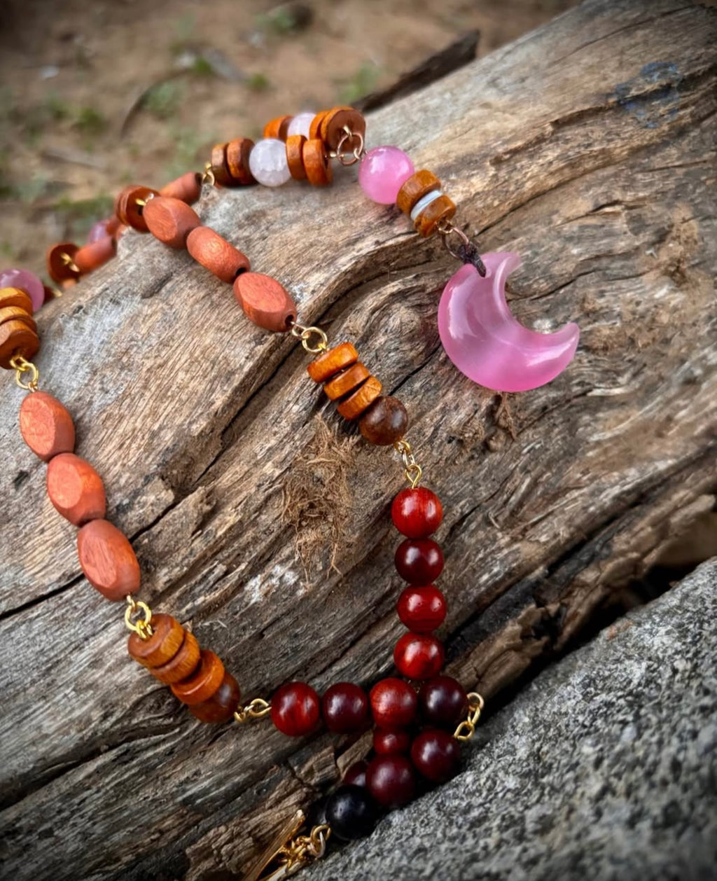 Pink cats eye, crescent moon with wooden chain