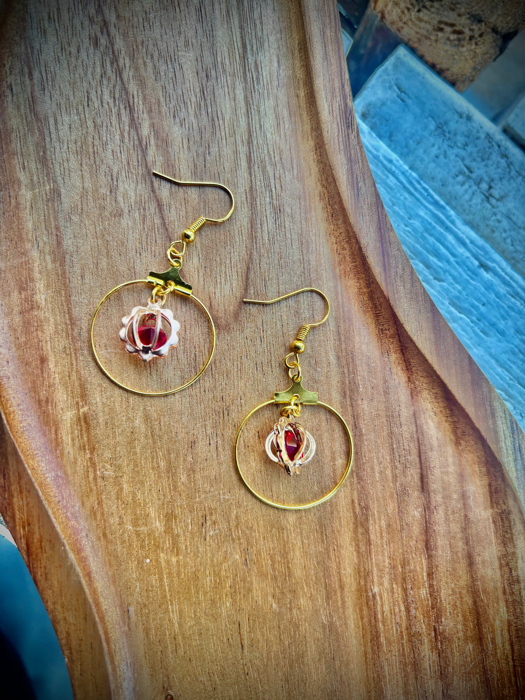 Gold Tone Hoop Dangle Earrings with Red Gem