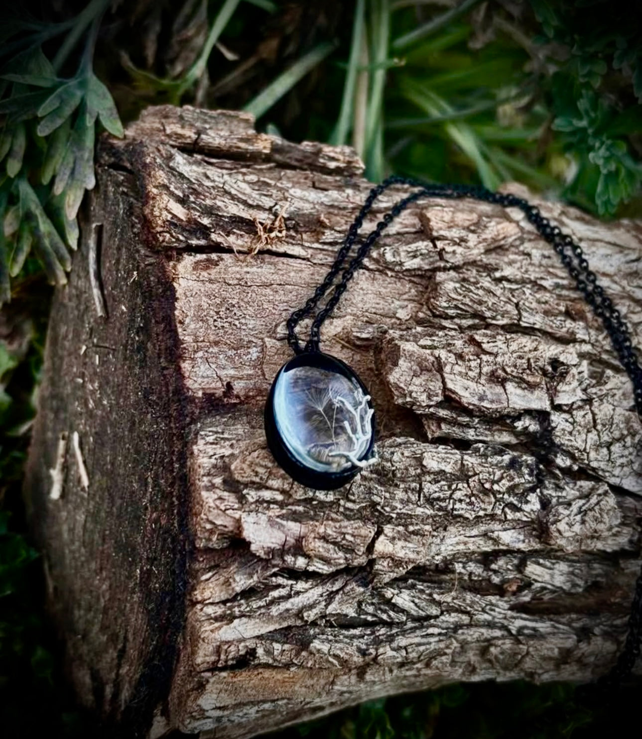 Black dandelion necklace