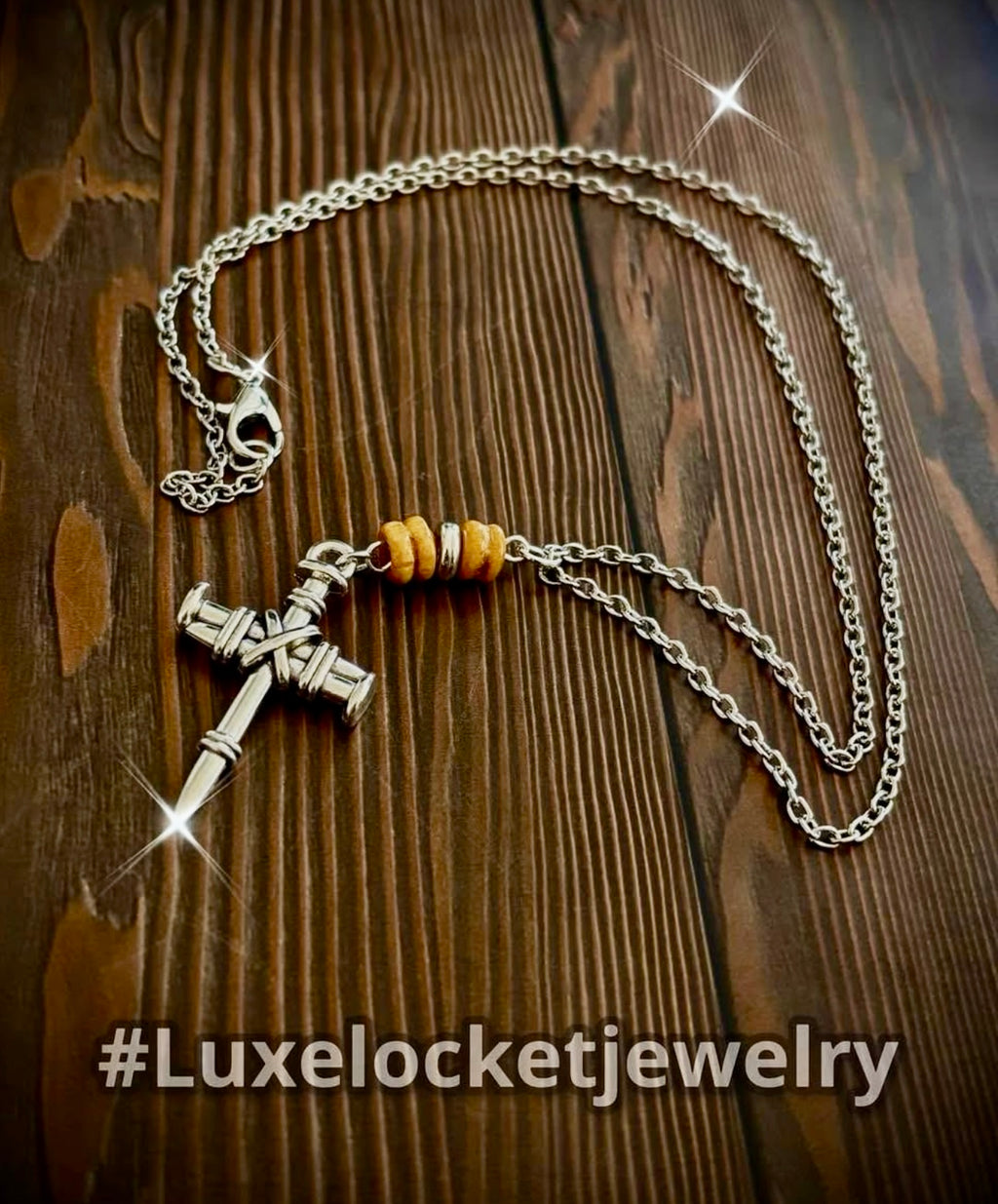 White silver nail cross