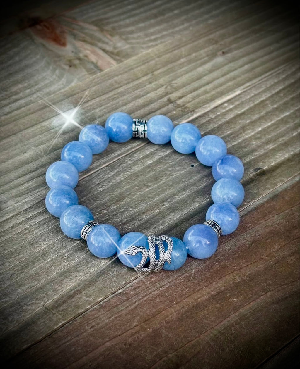 Aquamarine bracelet with silver snake