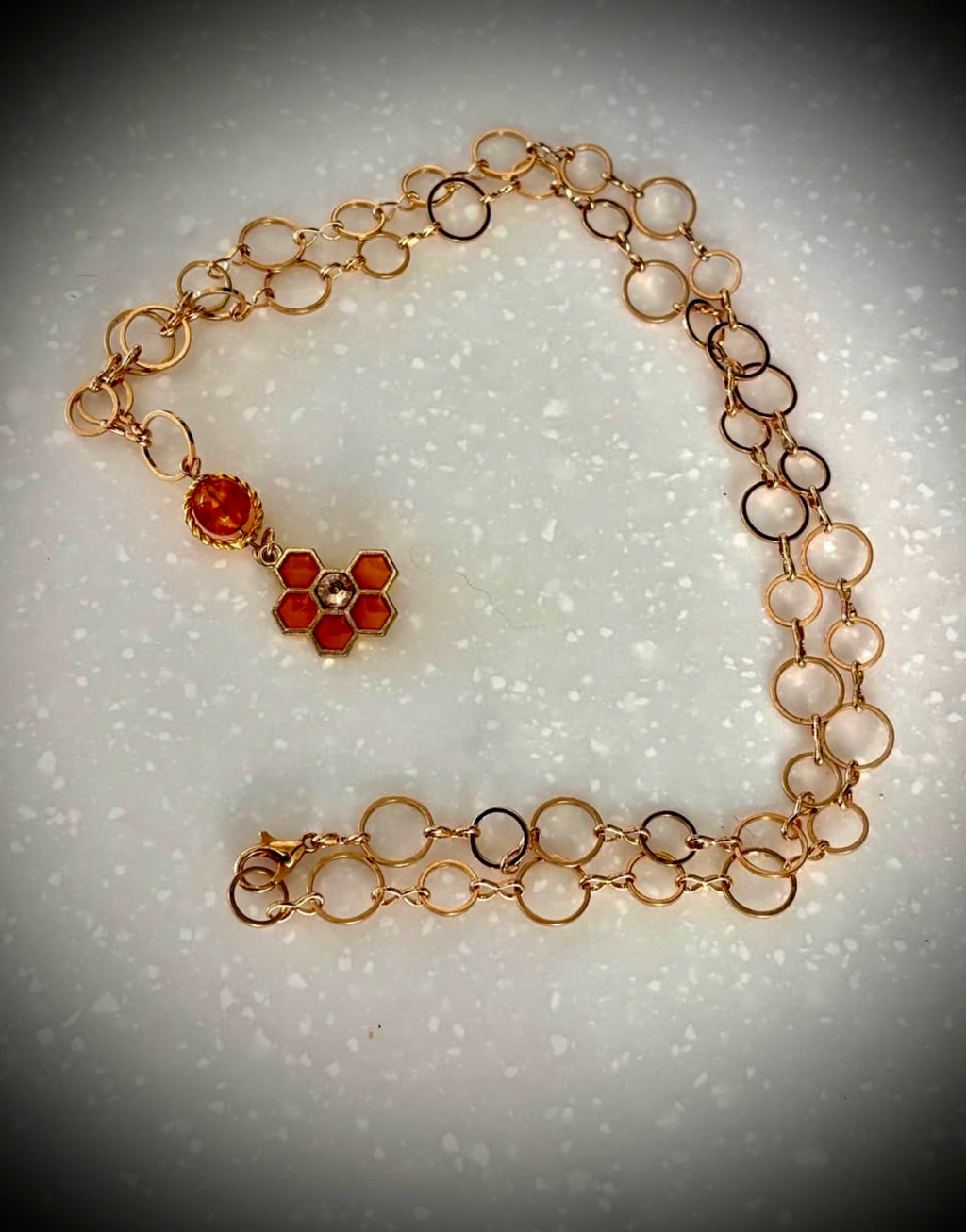 Honeycomb ringed necklace