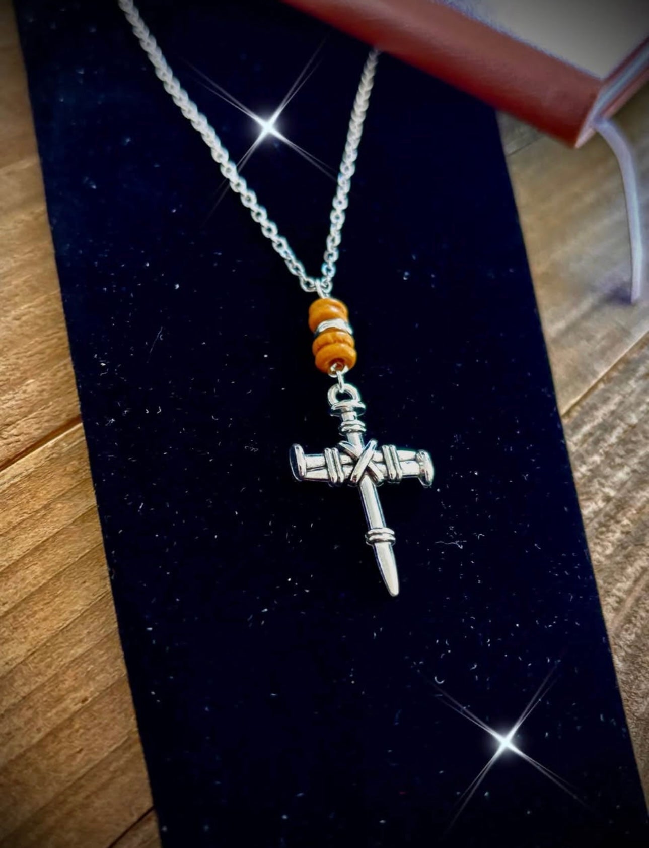 White silver nail cross