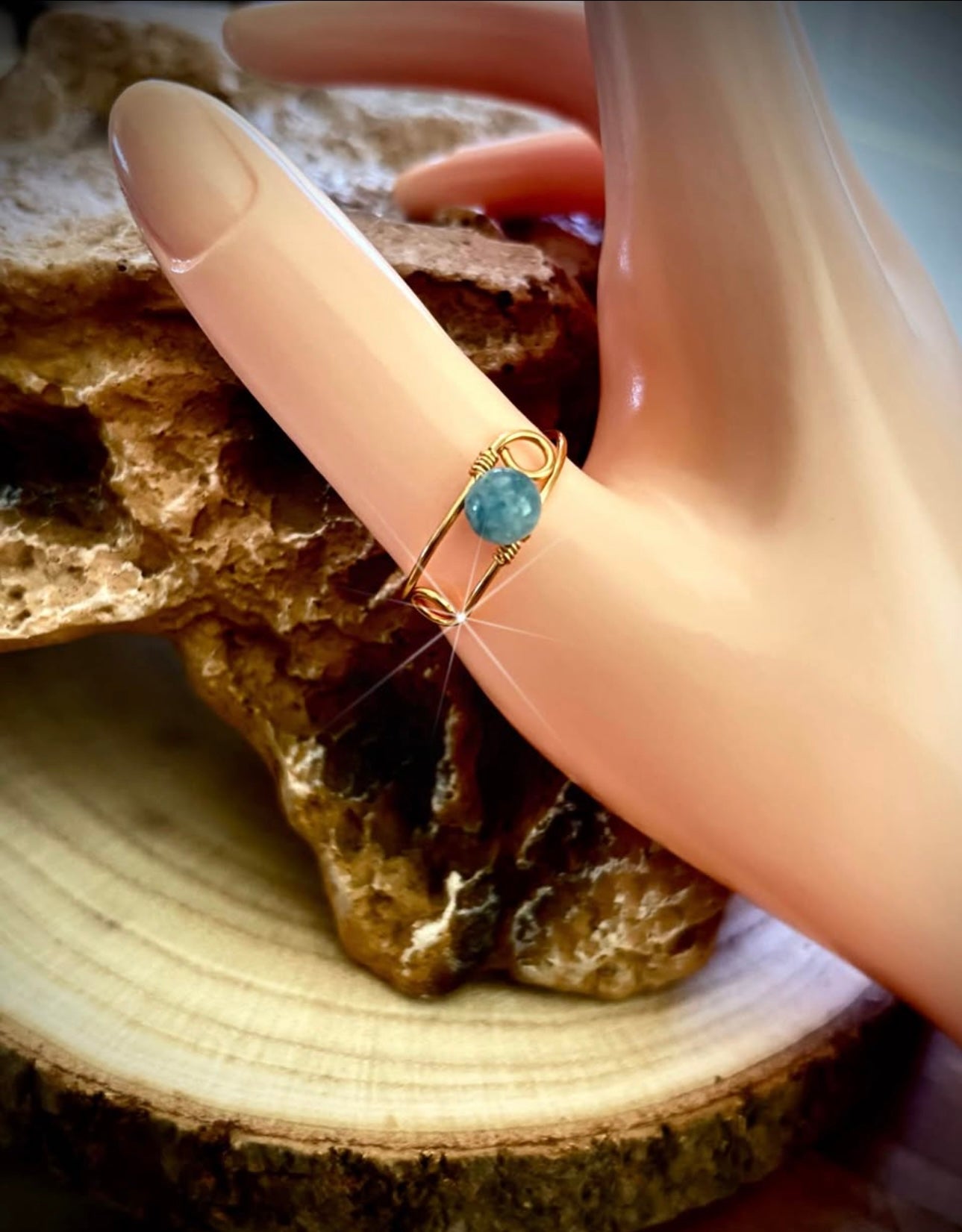 Gold wire wrap ring blue aquamarine