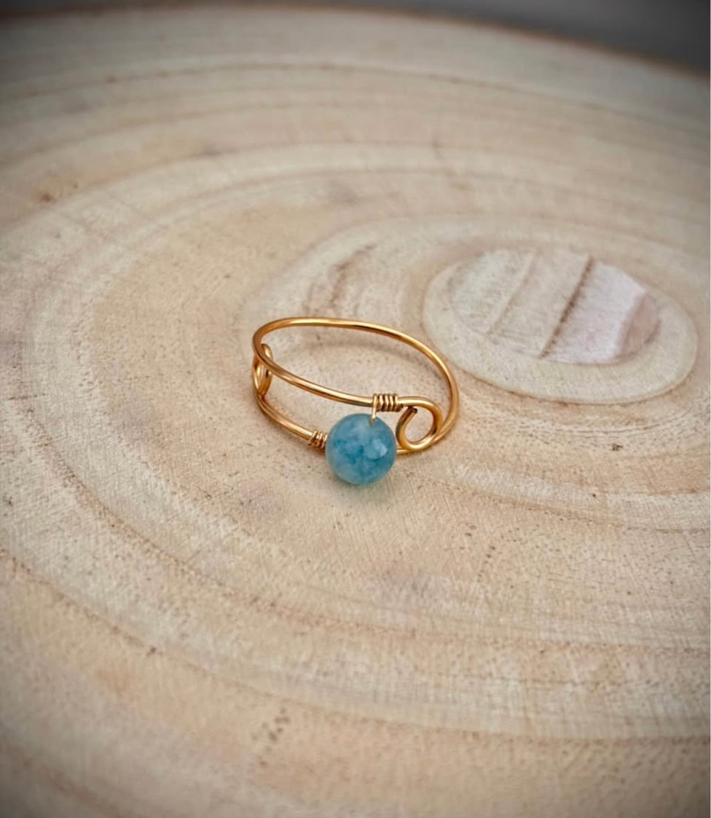 Gold wire wrap ring blue aquamarine
