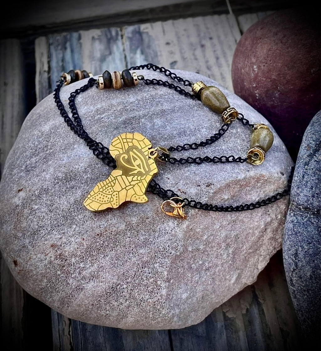 Golden African eye necklace