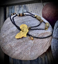 Golden African eye necklace