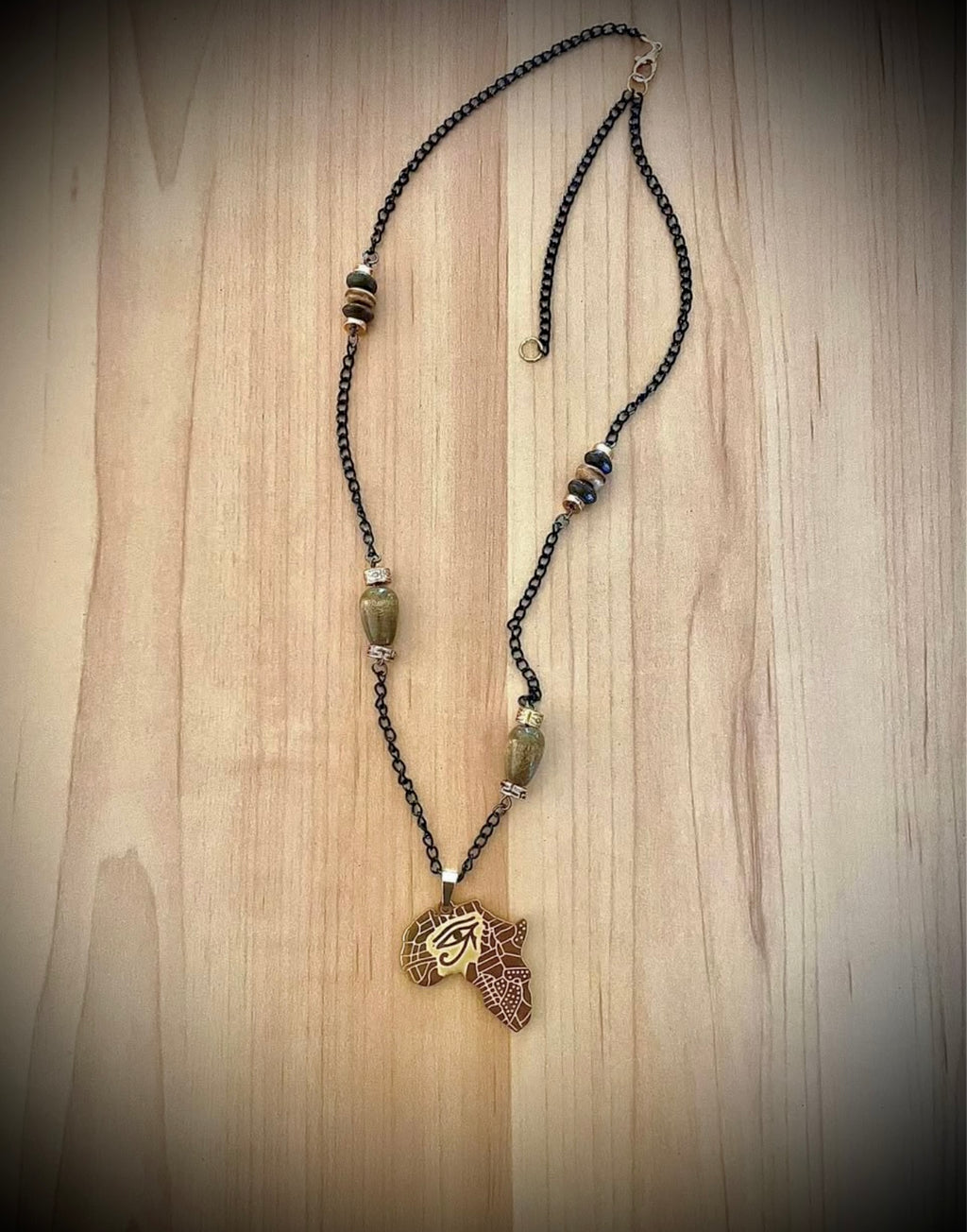 Golden African eye necklace
