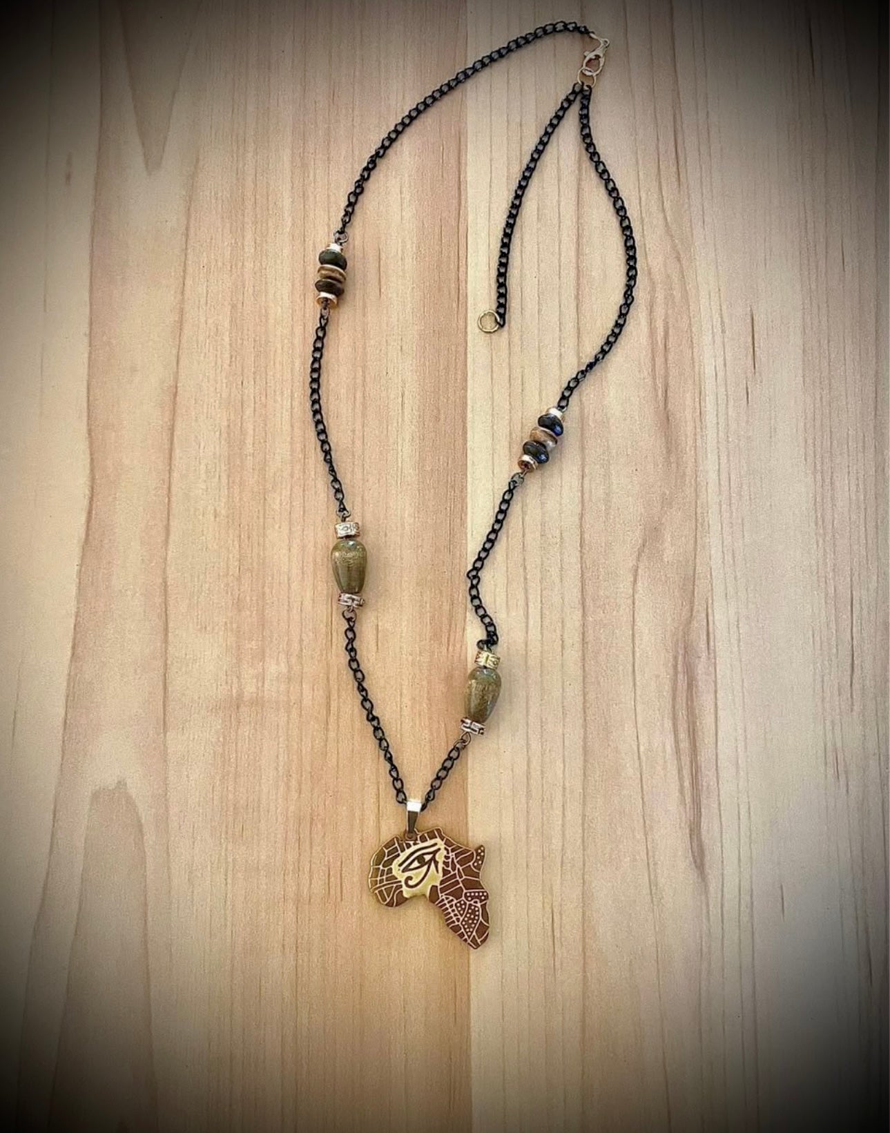 Golden African eye necklace