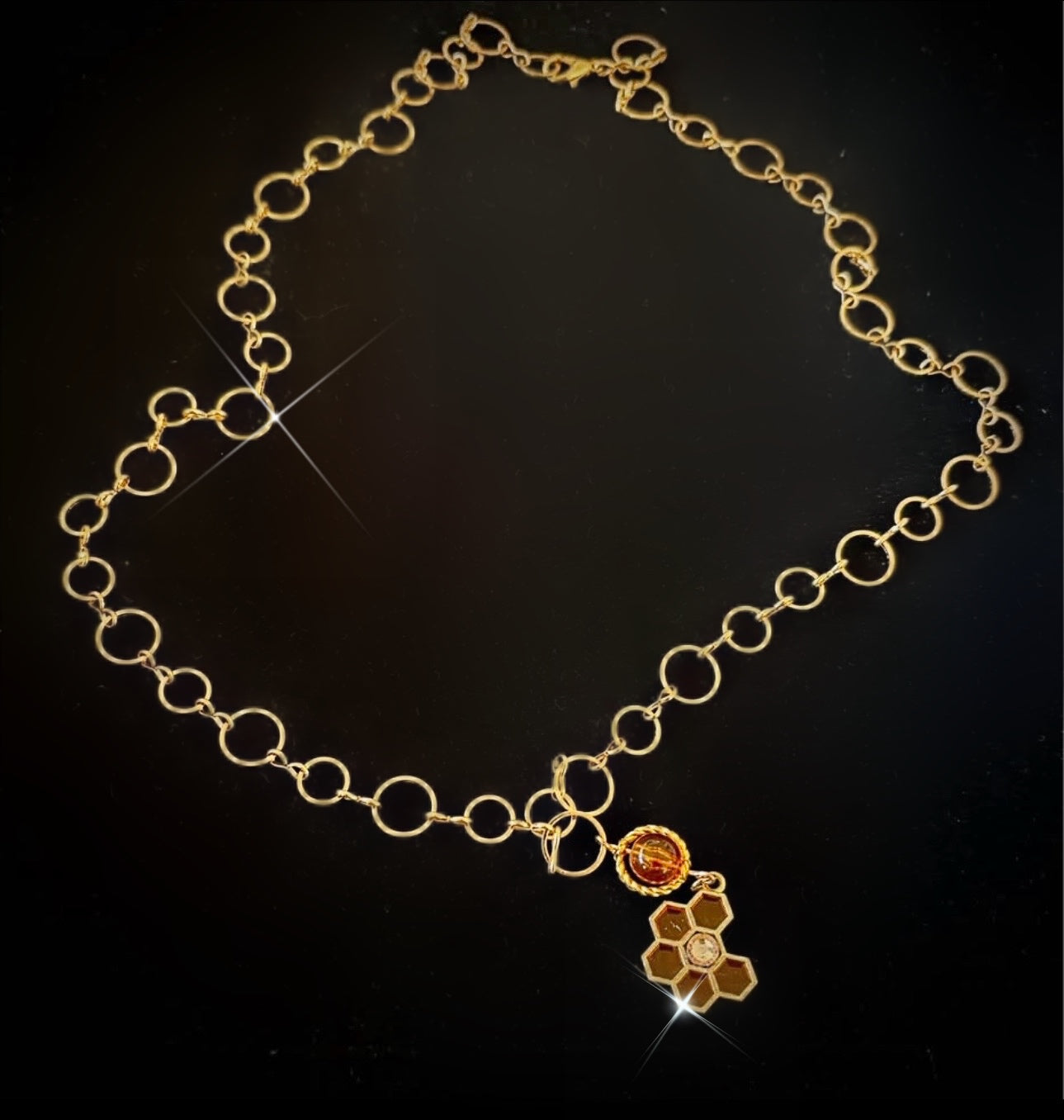 Honeycomb ringed necklace