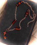 Golden sand stone Cross with coffee mantra beads, chain necklace.
