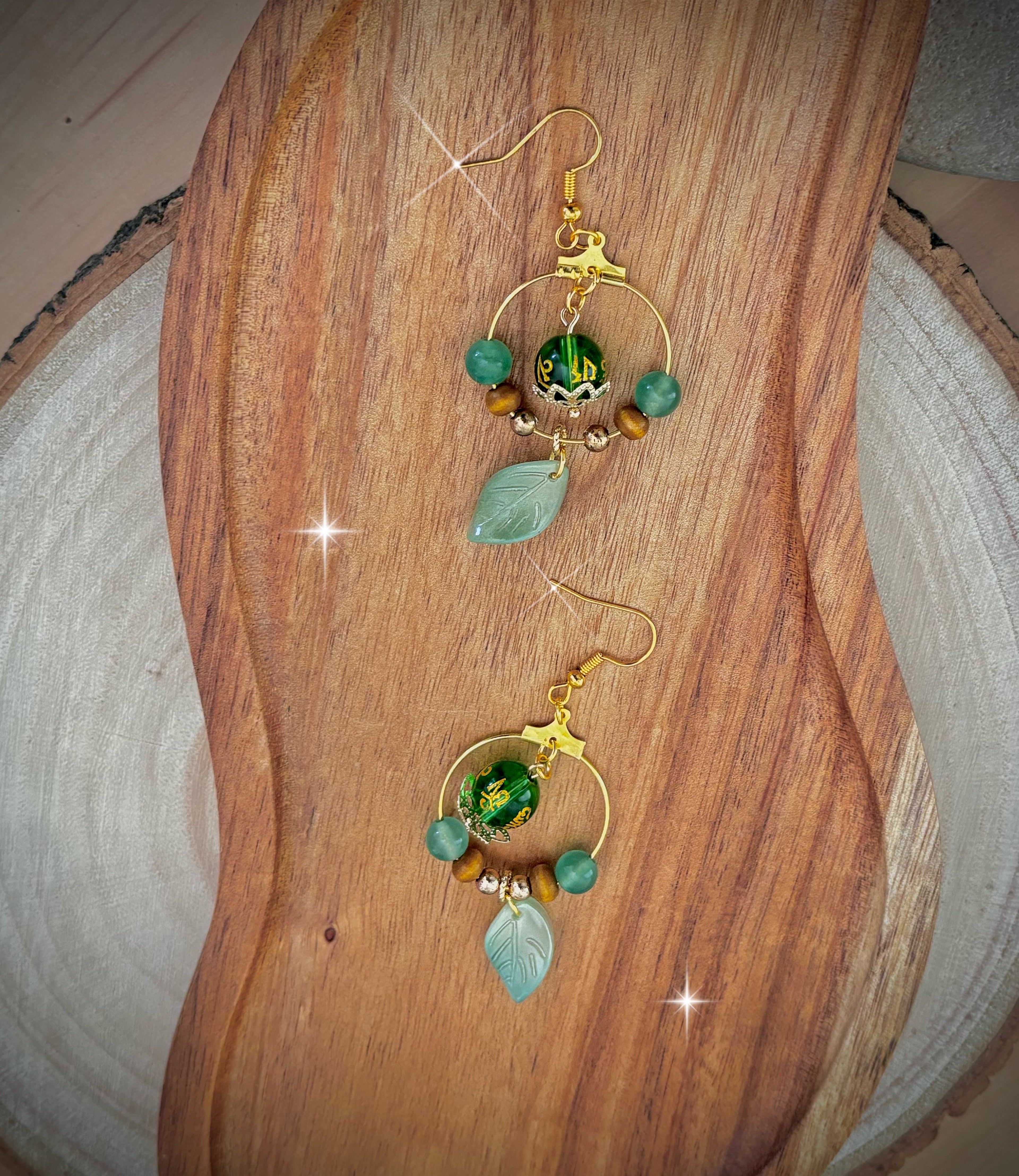 Green mantra leaf earrings