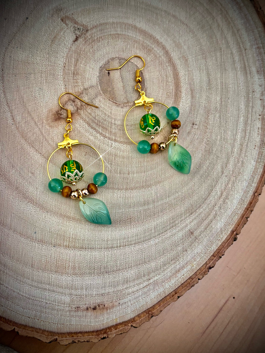 Green mantra leaf earrings