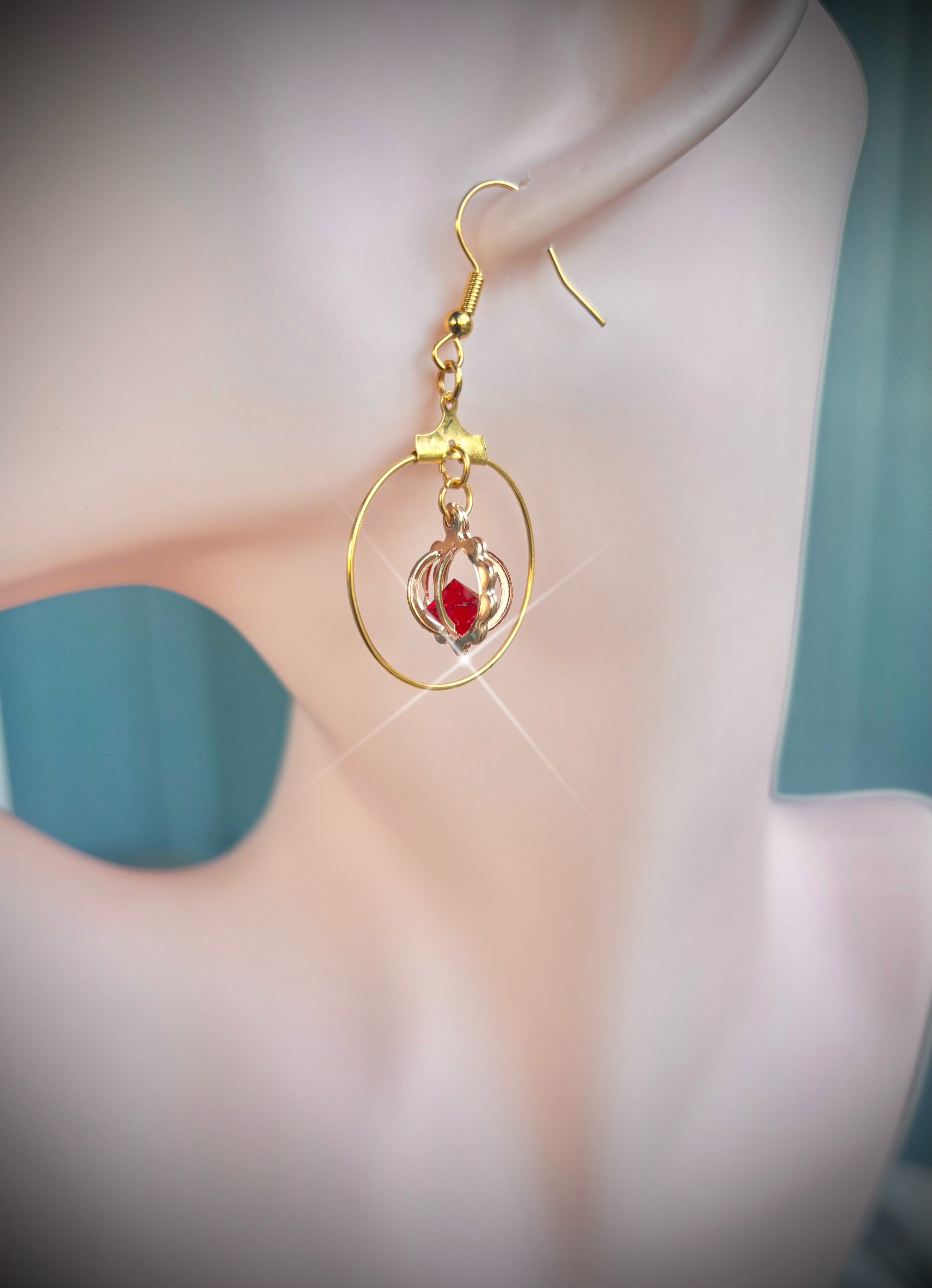 Gold Tone Hoop Dangle Earrings with Red Gem